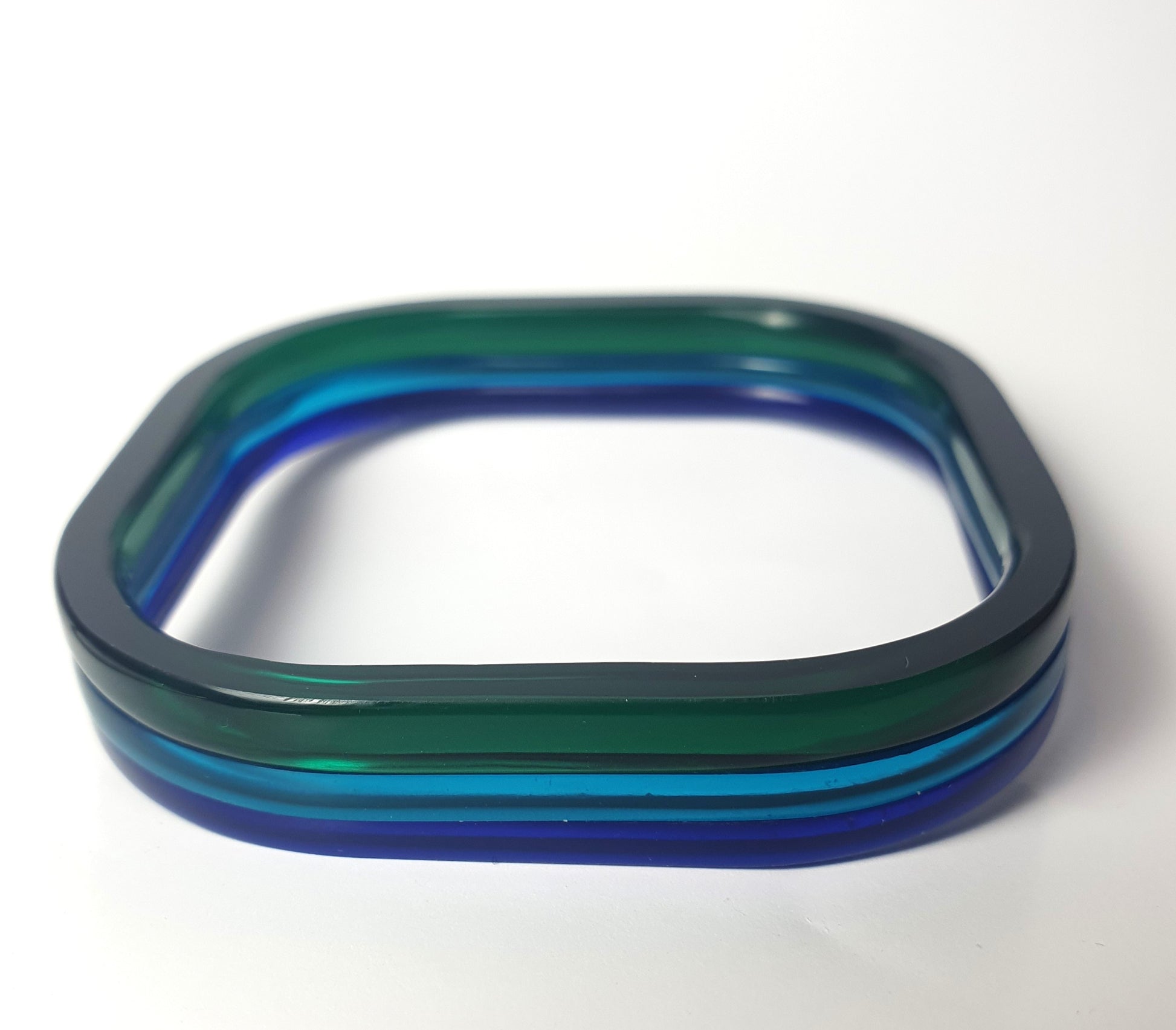 Set of square bangles in bottle green, azure and sapphire perspex #BarbaraSpenceJewellery